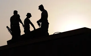 Working under a hot sun Working under a hot sun