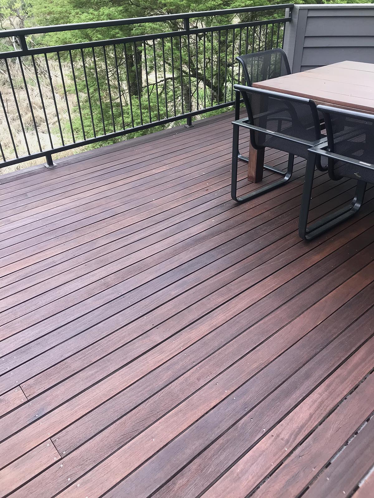 Cumaru 1x4 deck finished with ExoShield Walnut